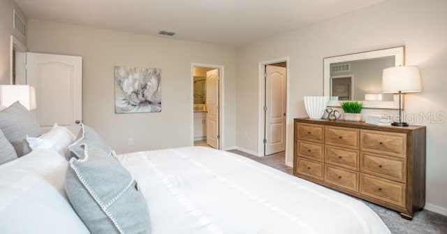 61 Bruce Ln, Palm Coast, FL 32137 - bedroom featuring baseboards and light carpet