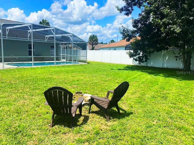 2650 Autumn Creek Cir, Kissimmee, FL 34747 - fenced backyard with glass enclosure