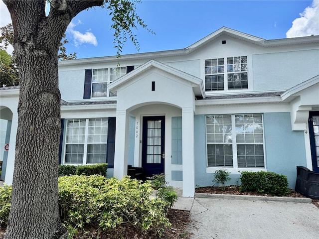 7682 Sir Kaufmann Ct, Kissimmee, FL 34747 - view of front of home with stucco siding