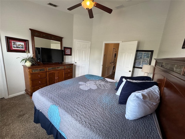 7682 Sir Kaufmann Ct, Kissimmee, FL 34747 - bedroom with carpet floors, a high ceiling, and a ceiling fan