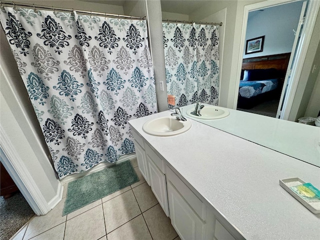 7682 Sir Kaufmann Ct, Kissimmee, FL 34747 - full bathroom with vanity, tile patterned floors, and curtained shower