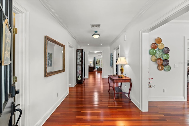 2312 S Summerlin Ave, Orlando, FL 32806 - hallway with wood finished floors and ornamental molding