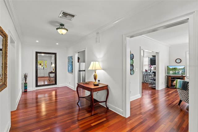 2312 S Summerlin Ave, Orlando, FL 32806 - hall with healthy amount of natural light, ornamental molding, wood finished floors, and recessed lighting