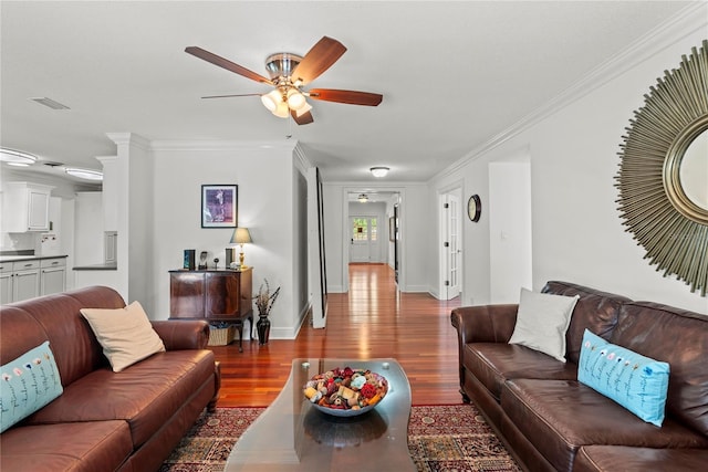 2312 S Summerlin Ave, Orlando, FL 32806 - living area featuring ceiling fan, wood finished floors, and crown molding