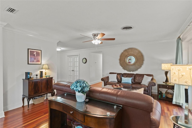 2312 S Summerlin Ave, Orlando, FL 32806 - living room with crown molding, wood finished floors, and a ceiling fan