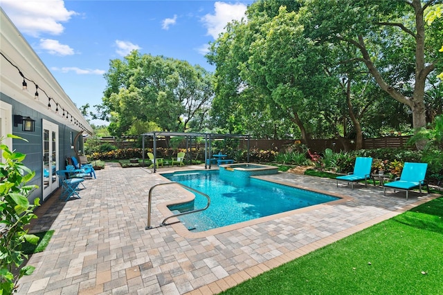 2312 S Summerlin Ave, Orlando, FL 32806 - view of swimming pool featuring french doors, a fenced backyard, a pergola, and a patio area