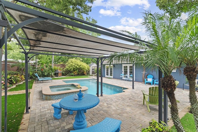 2312 S Summerlin Ave, Orlando, FL 32806 - view of swimming pool with a pergola, an outbuilding, a patio area, french doors, and a pool with connected hot tub