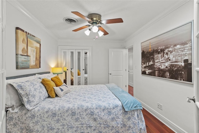 2312 S Summerlin Ave, Orlando, FL 32806 - bedroom with ornamental molding, dark wood-style flooring, french doors, and a ceiling fan