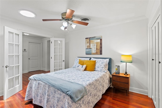 2312 S Summerlin Ave, Orlando, FL 32806 - bedroom with ornamental molding, wood finished floors, french doors, and ceiling fan