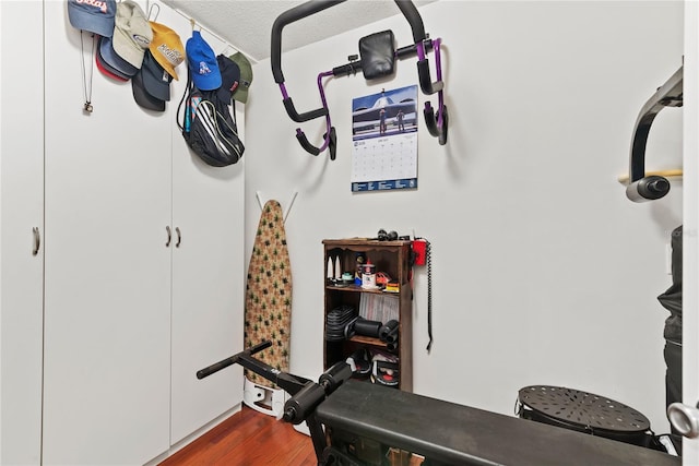 2312 S Summerlin Ave, Orlando, FL 32806 - exercise room featuring dark wood finished floors