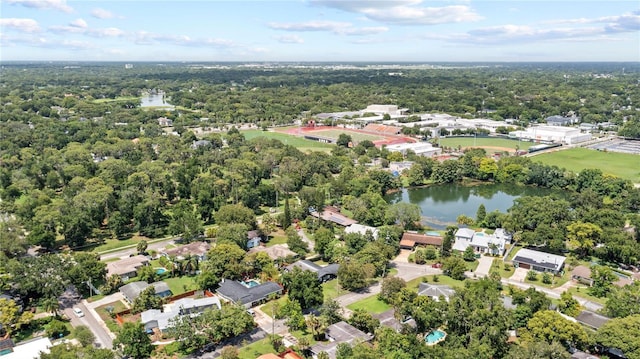 2312 S Summerlin Ave, Orlando, FL 32806 - aerial view of property and surrounding area with a forest and a large body of water