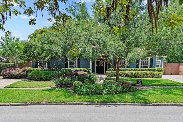 2312 S Summerlin Ave, Orlando, FL 32806 - obstructed view of property with a front lawn
