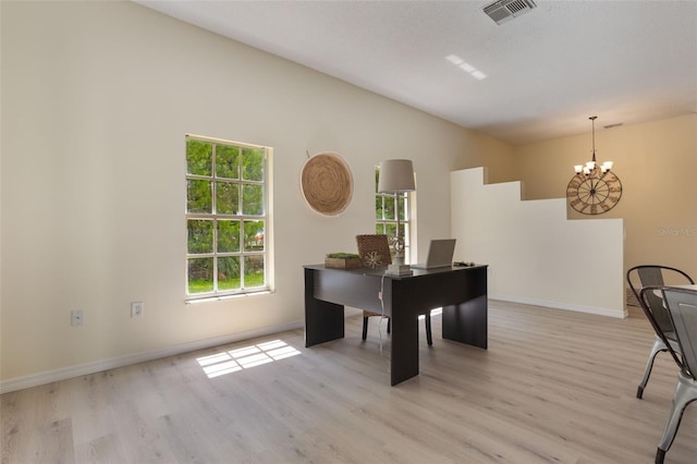 1065 Universal Rest Pl, Kissimmee, FL 34744 - office area with light wood-style floors, a chandelier, and vaulted ceiling