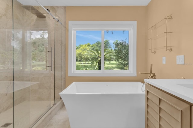 202 Riverview Dr, Longwood, FL 32779 - full bath with a soaking tub, plenty of natural light, a shower stall, and vanity