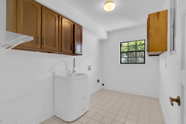 202 Riverview Dr, Longwood, FL 32779 - laundry area with cabinet space, hookup for a washing machine, and a textured ceiling