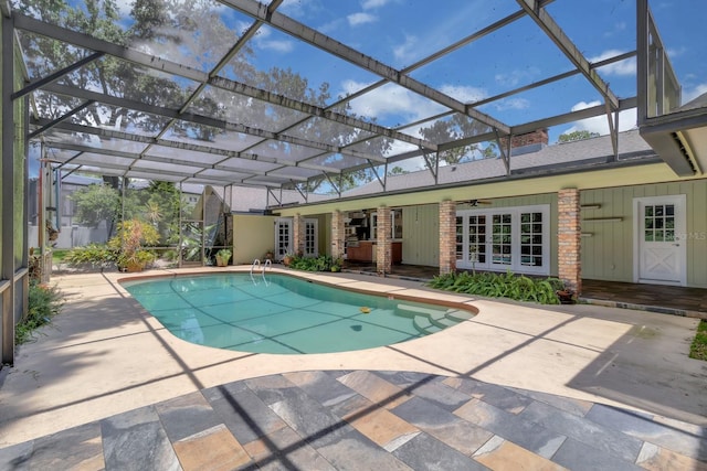 202 Riverview Dr, Longwood, FL 32779 - outdoor pool with ceiling fan, a patio area, and glass enclosure