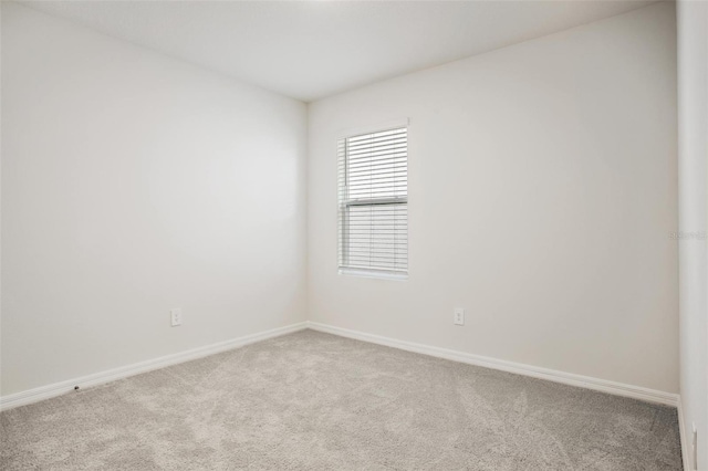 17127 Harvest Moon Way, Bradenton, FL 34211 - carpeted empty room featuring baseboards
