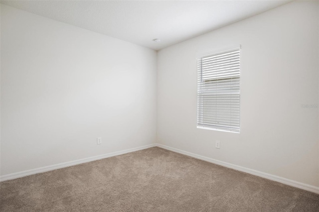 17127 Harvest Moon Way, Bradenton, FL 34211 - spare room featuring carpet floors and baseboards