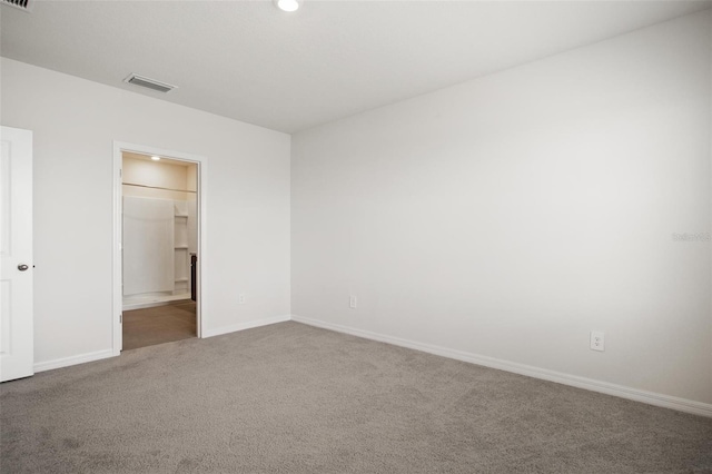 17127 Harvest Moon Way, Bradenton, FL 34211 - unfurnished bedroom featuring carpet floors, recessed lighting, and connected bathroom
