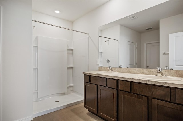 17127 Harvest Moon Way, Bradenton, FL 34211 - bathroom featuring a shower and double vanity