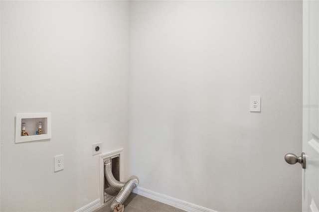 17127 Harvest Moon Way, Bradenton, FL 34211 - laundry area featuring hookup for an electric dryer, hookup for a washing machine, and tile patterned floors