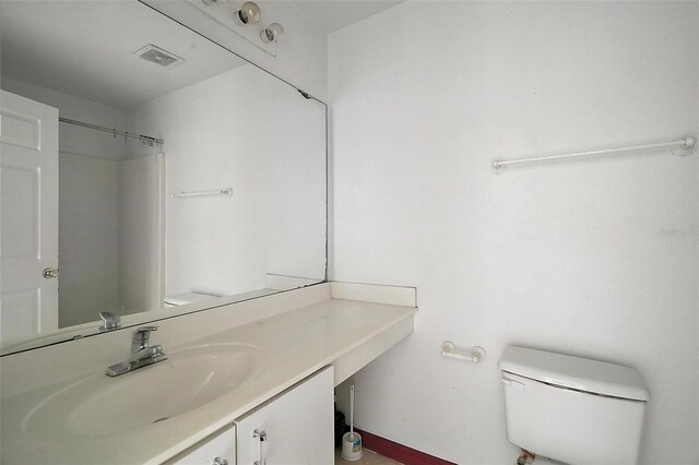 979 Mayfair St, Eustis, FL 32726 - full bathroom featuring toilet and vanity