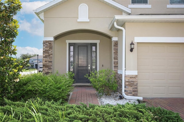 1222 Castlevecchio Loop, Orlando, FL 32825 - entrance to property with stone siding and stucco siding