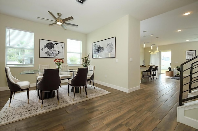 1222 Castlevecchio Loop, Orlando, FL 32825 - dining room featuring plenty of natural light, dark wood-type flooring, and recessed lighting