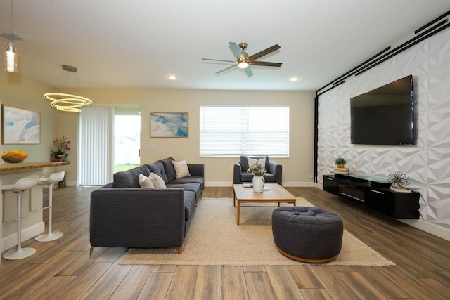 1222 Castlevecchio Loop, Orlando, FL 32825 - living room featuring wood finished floors, ceiling fan, and recessed lighting