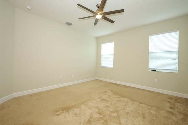 1222 Castlevecchio Loop, Orlando, FL 32825 - unfurnished room featuring ceiling fan, light carpet, and a smoke detector