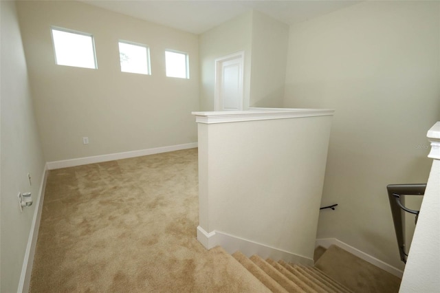 1222 Castlevecchio Loop, Orlando, FL 32825 - stairs with carpet flooring and baseboards