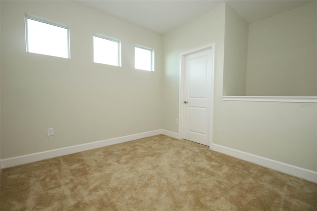 1222 Castlevecchio Loop, Orlando, FL 32825 - spare room featuring carpet floors and baseboards
