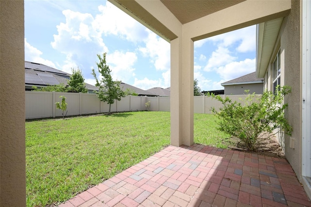 1222 Castlevecchio Loop, Orlando, FL 32825 - fenced backyard with a patio area