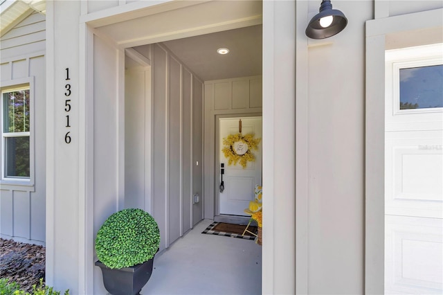 12260 SW 56th Ln, Ocala, FL 34481 - doorway to property featuring board and batten siding