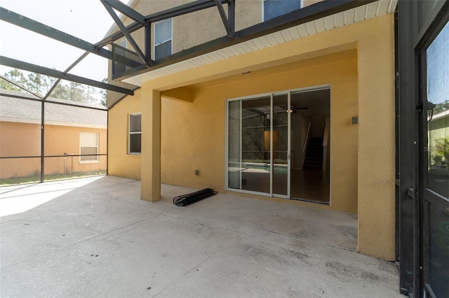 1129 Royal Ridge Dr, Davenport, FL 33896 - view of patio featuring glass enclosure