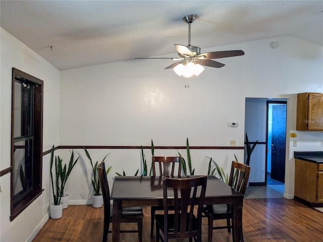 3021 Norvell Ct, Deltona, FL 32738 - dining space with lofted ceiling, dark wood-style flooring, and ceiling fan