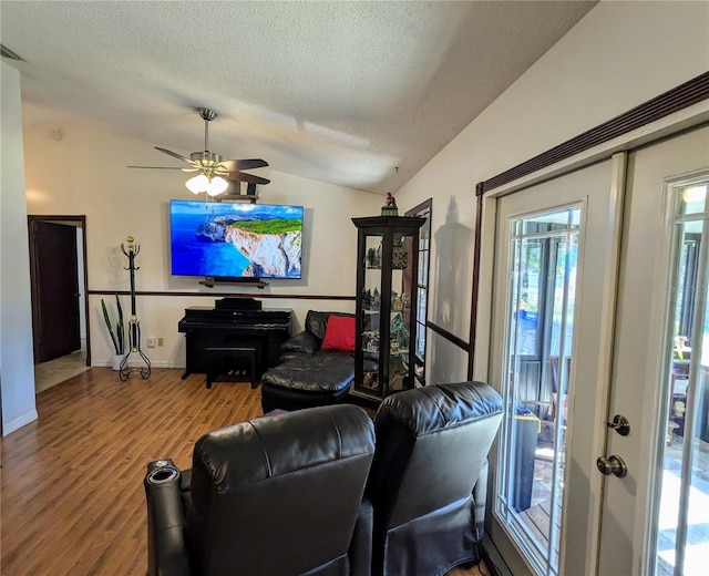 3021 Norvell Ct, Deltona, FL 32738 - living room featuring wood finished floors, a textured ceiling, lofted ceiling, and ceiling fan