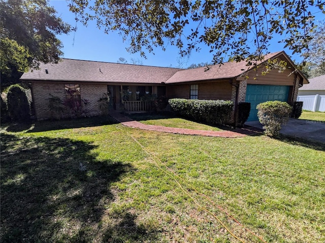 3021 Norvell Ct, Deltona, FL 32738 - single story home with brick siding, an attached garage, and asphalt driveway