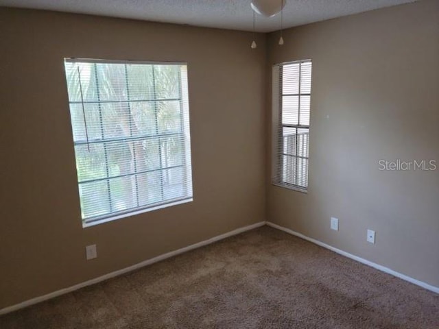 236 Afton Sq Unit 207, Altamonte Springs, FL 32714 - empty room featuring carpet and ceiling fan