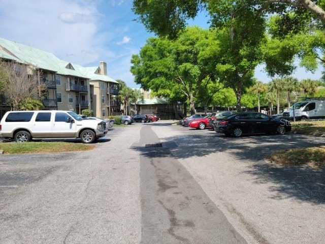 236 Afton Sq Unit 207, Altamonte Springs, FL 32714 - view of asphalt road with a residential view