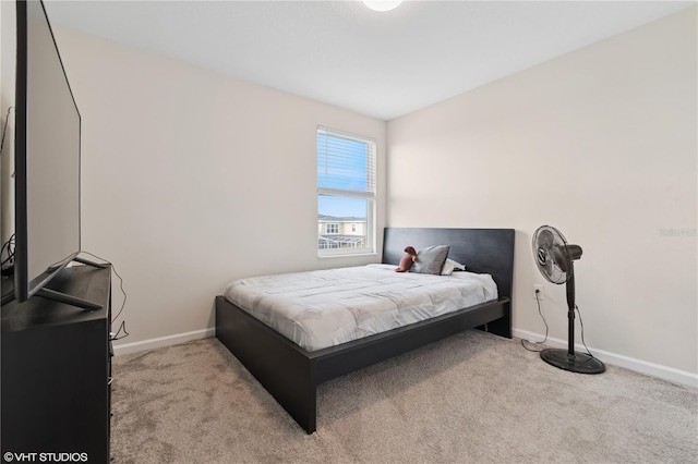 8955 Fluffy Lie Ct, Davenport, FL 33896 - carpeted bedroom featuring baseboards