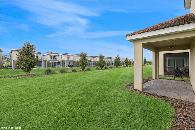 8955 Fluffy Lie Ct, Davenport, FL 33896 - view of green lawn with a patio and a residential view