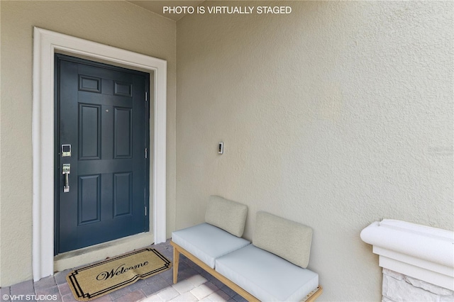 8955 Fluffy Lie Ct, Davenport, FL 33896 - entrance to property featuring stucco siding
