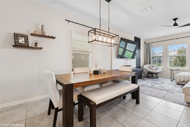 8955 Fluffy Lie Ct, Davenport, FL 33896 - dining space featuring light tile patterned floors and a ceiling fan