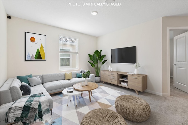 8955 Fluffy Lie Ct, Davenport, FL 33896 - living room with light carpet and baseboards