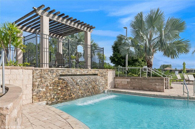 8955 Fluffy Lie Ct, Davenport, FL 33896 - community pool with a pergola