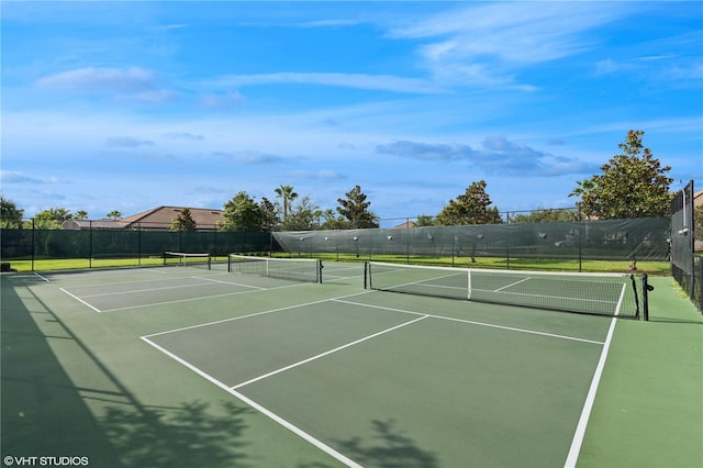 8955 Fluffy Lie Ct, Davenport, FL 33896 - view of tennis court featuring community basketball court