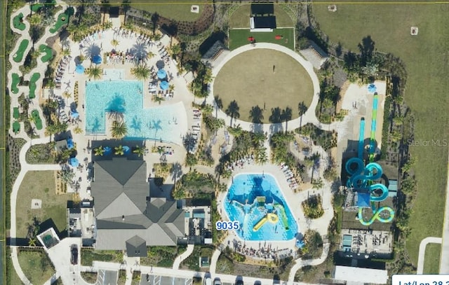 8955 Fluffy Lie Ct, Davenport, FL 33896 - bird's eye view of a pool area