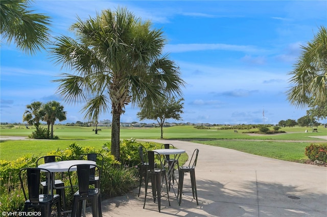8955 Fluffy Lie Ct, Davenport, FL 33896 - view of patio / terrace featuring view of golf course