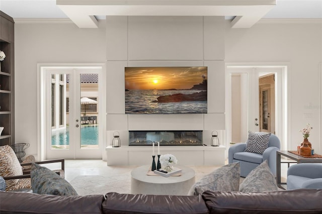 3426 Cocard Ct, Windermere, FL 34786 - living area with a glass covered fireplace, built in features, and crown molding